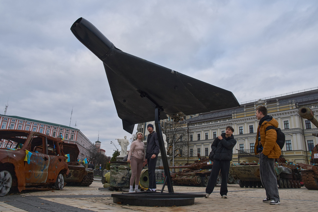 Downtown Kyiv, people look at a damaged Russian heavy drone installed as a symbol of war. Source: AP Photo/Efrem Lukatsky